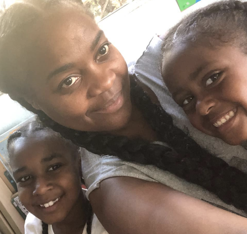 Ms. Tee and two little girls with their hair all braided the same.