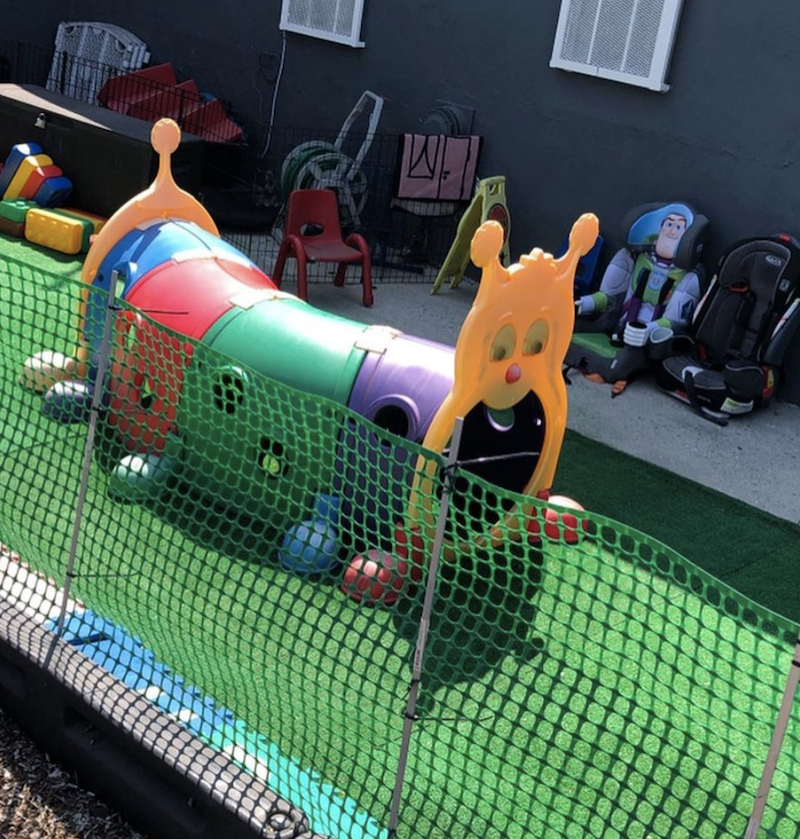The kids have fun playing in this Climb-N-Crawl Caterpillar outdoor play structure.